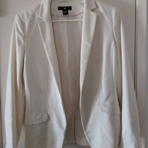 Cream blazer. H&M size 8. Good used condition.